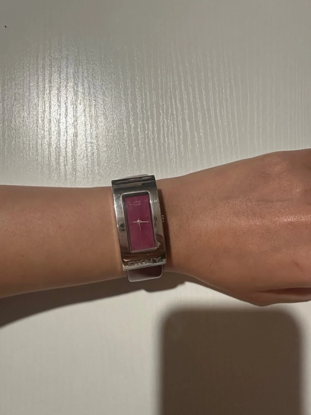 Women’s elegant DKNY Magenta Dial Silver-Tone Bangle Watch